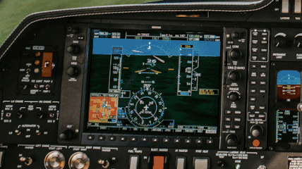 PaperMETAR on a pilot's desk with aviation charts and equipment
